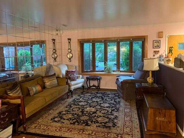 Cozy common area with seating and large windows