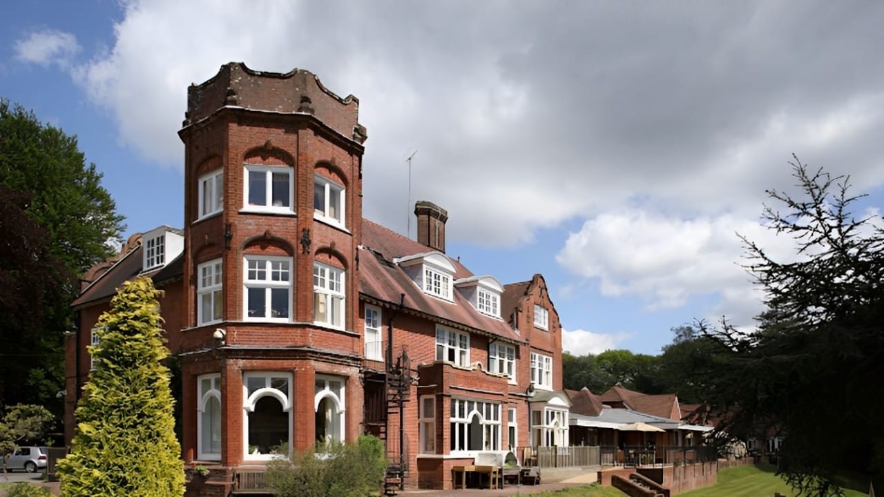 Exterior view of Huntington House with gardens