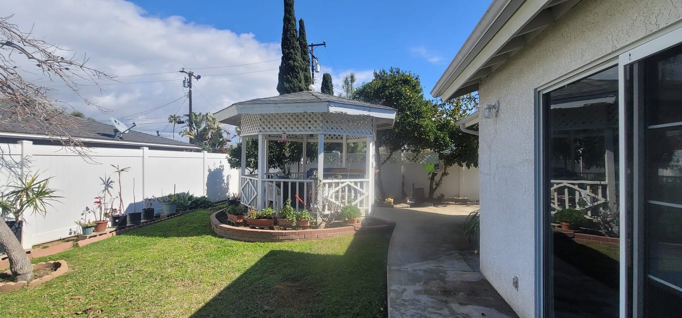 A serene outdoor garden with a gazebo