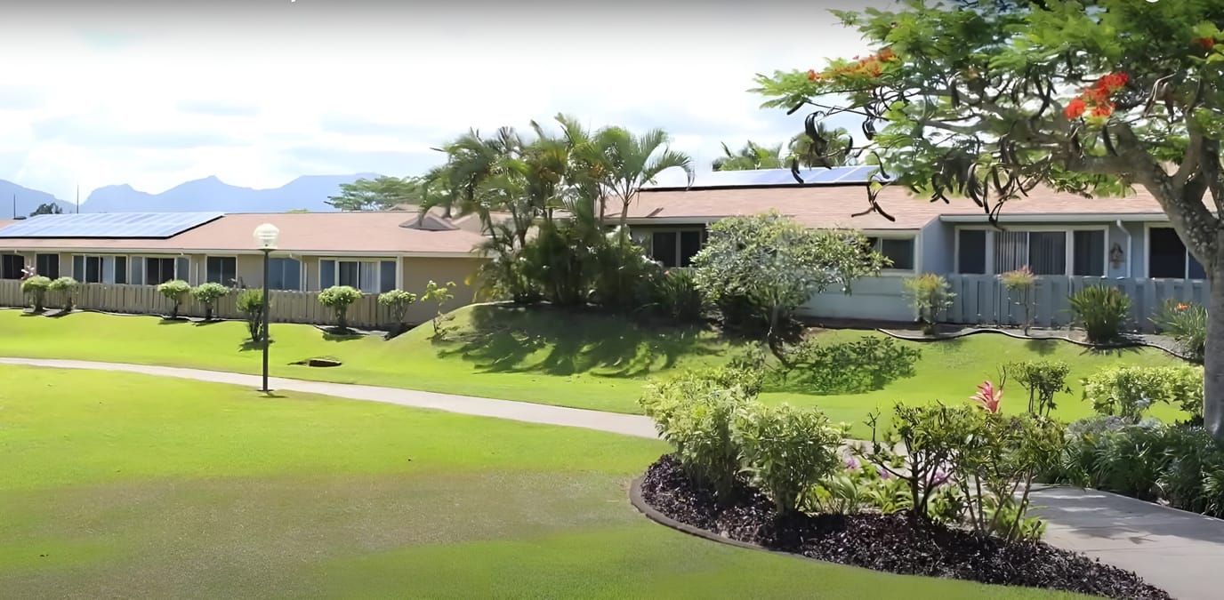 Exterior view of Olaloa Retirement Community with landscaped grounds
