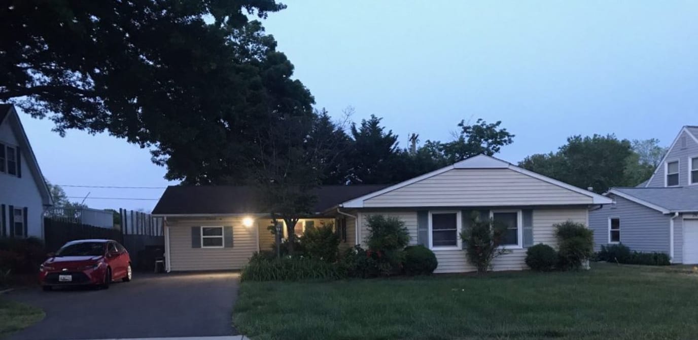 Exterior view of the assisted living facility in the evening