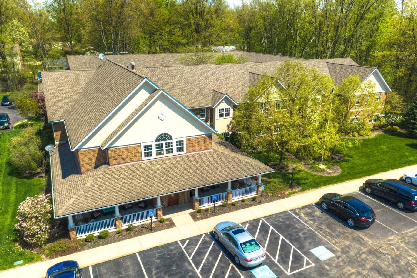 Aerial view of the facility building and surrounding landscaping