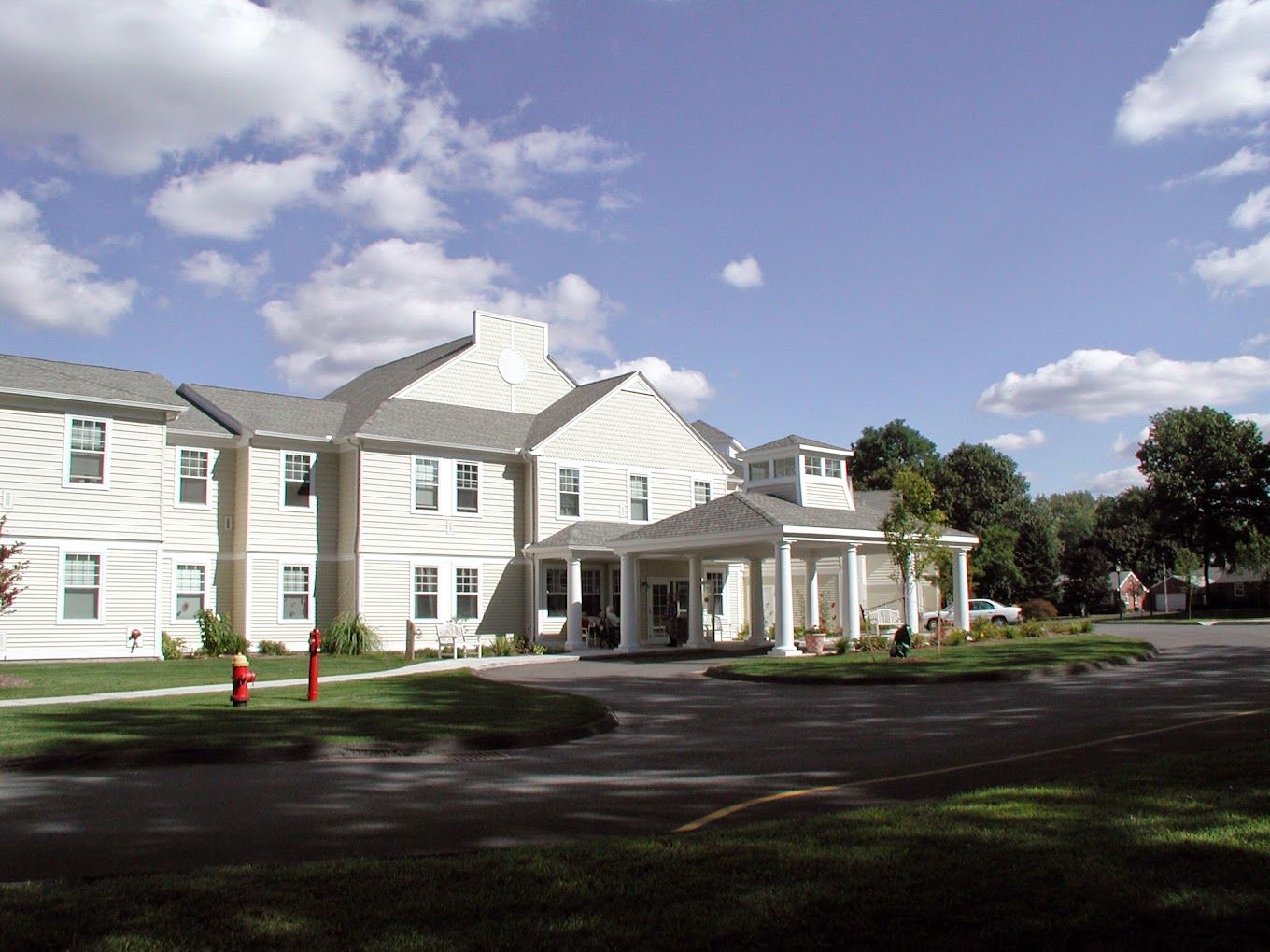 Exterior view of The Arbors at Chicopee assisted living facility