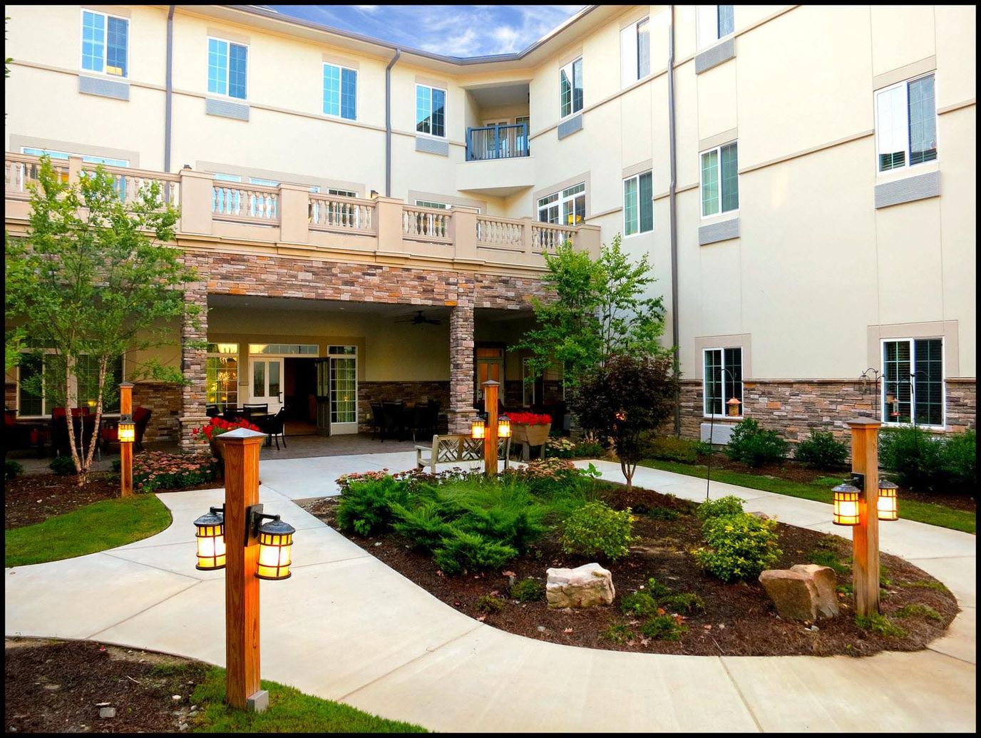 Courtyard area with landscaped garden and lighting
