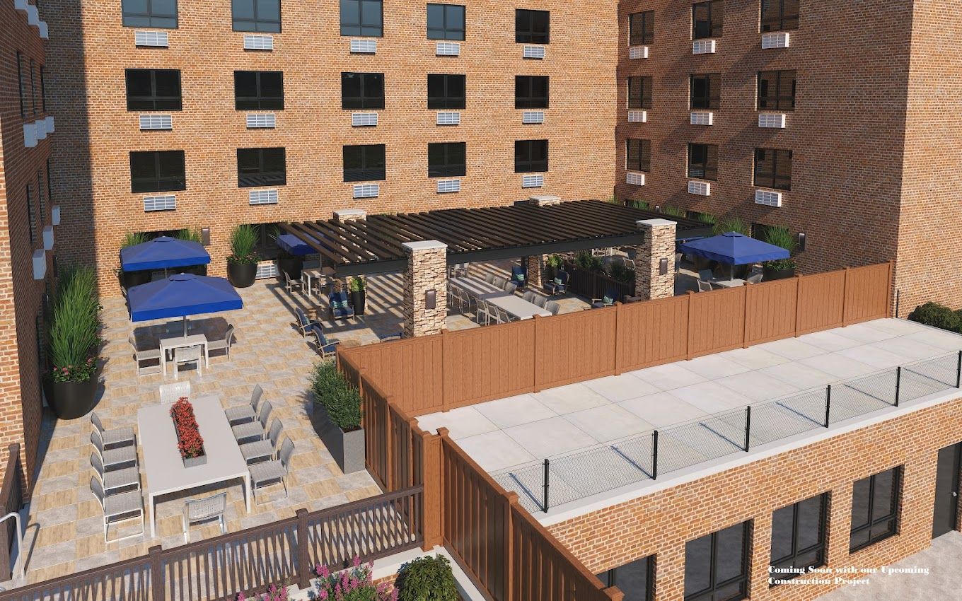 Aerial view of a patio area with seating and shading