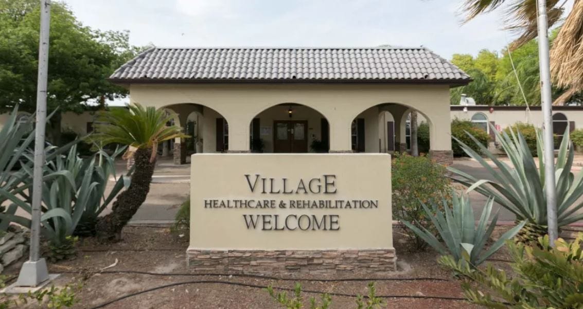 Exterior view of Village Healthcare and Rehabilitation entrance