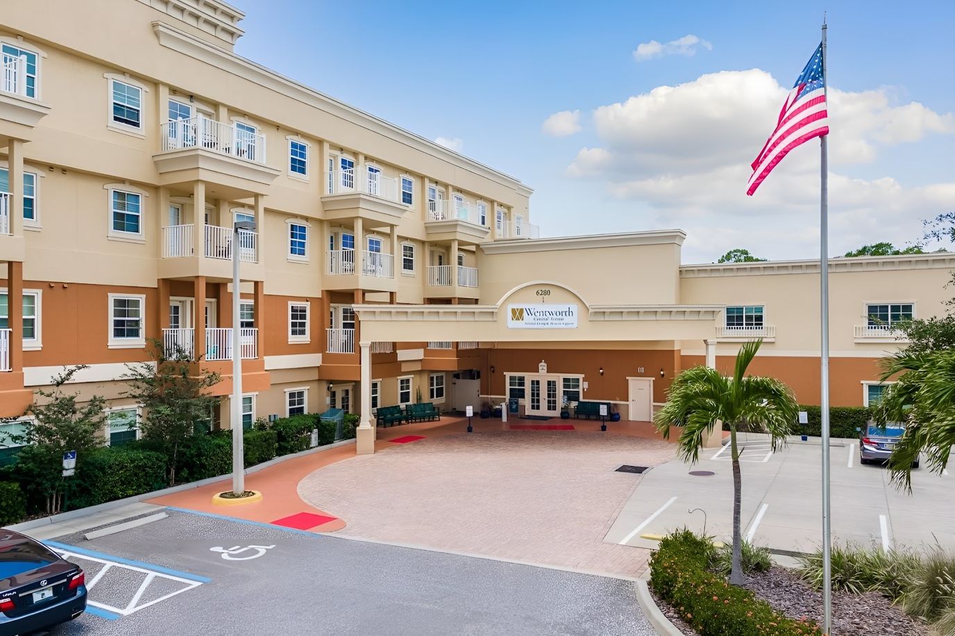 Front entrance of Wentworth Central Avenue with American flag