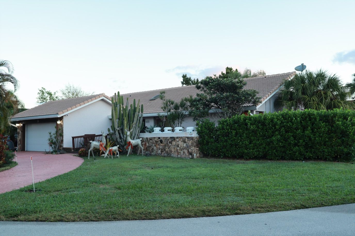 Exterior view of a senior living facility with landscaping