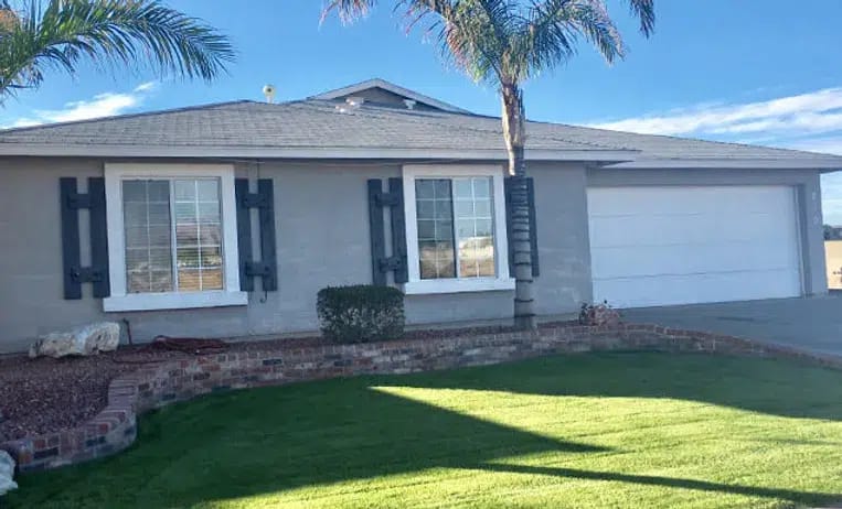 Exterior view of a house with landscaping