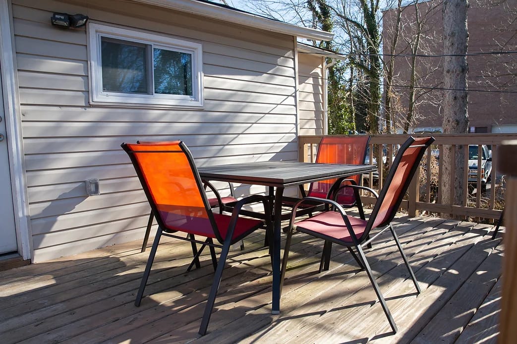 Outdoor seating area with colorful chairs