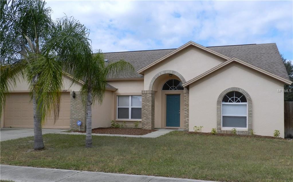 Exterior view of a residential building with landscaping