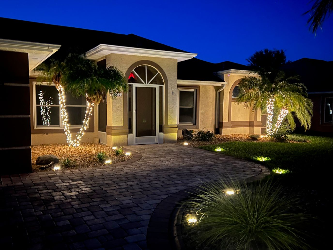 Front entrance of Villa Lea At Viera with evening lighting