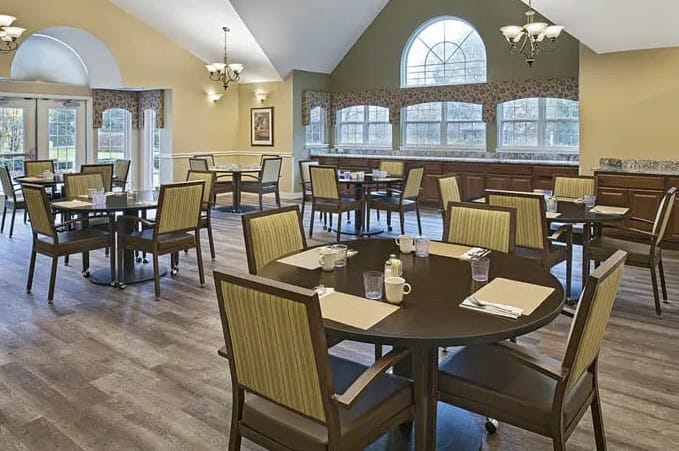 Dining area with tables and chairs arranged