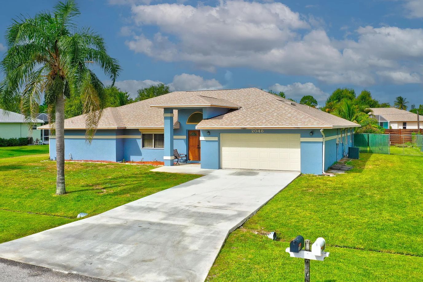 Exterior view of a blue residential building