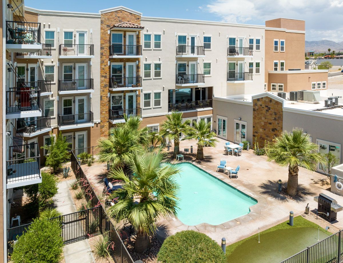 Aerial view of a pool and landscaped outdoor space