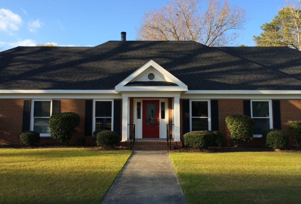 Exterior view of a senior living facility with a welcoming entrance