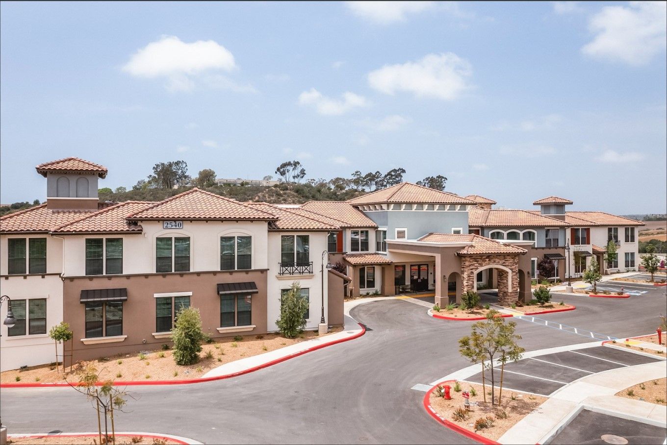Aerial view of the facility building and entrance