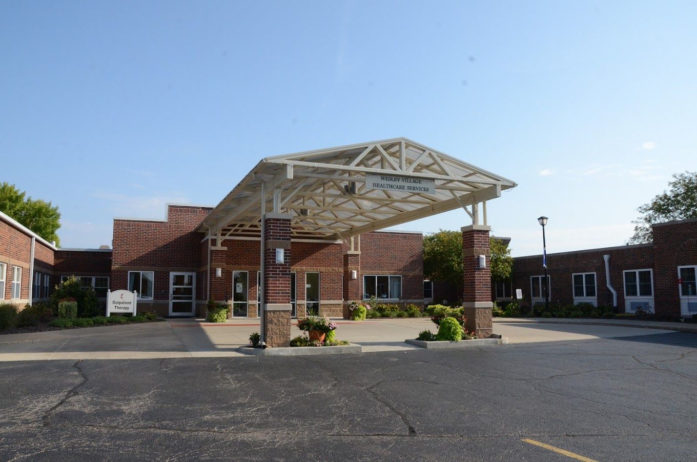 Exterior view of Wesley Village Retirement Center entrance