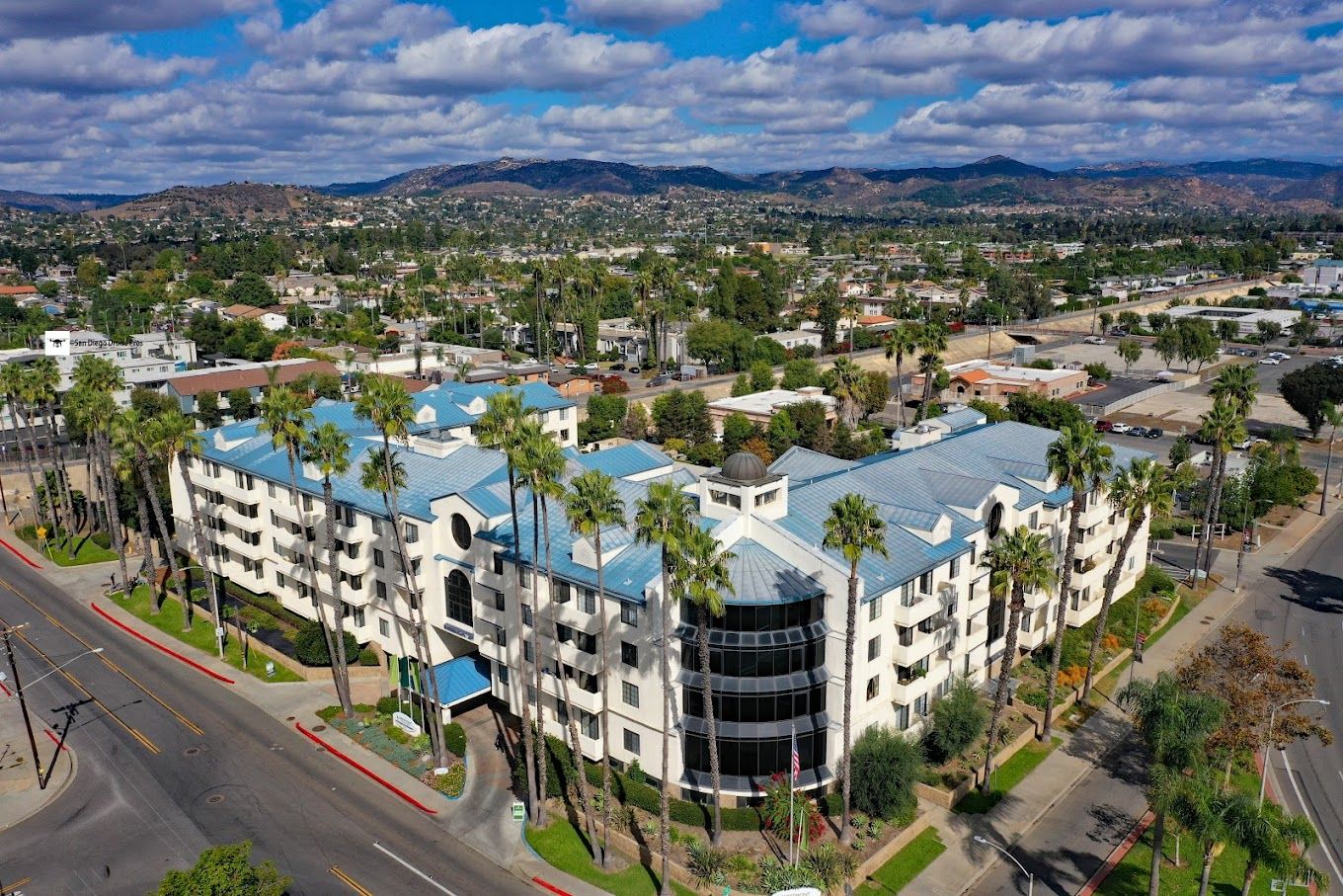 Aerial view of Westmont of Escondido facility with palm trees
