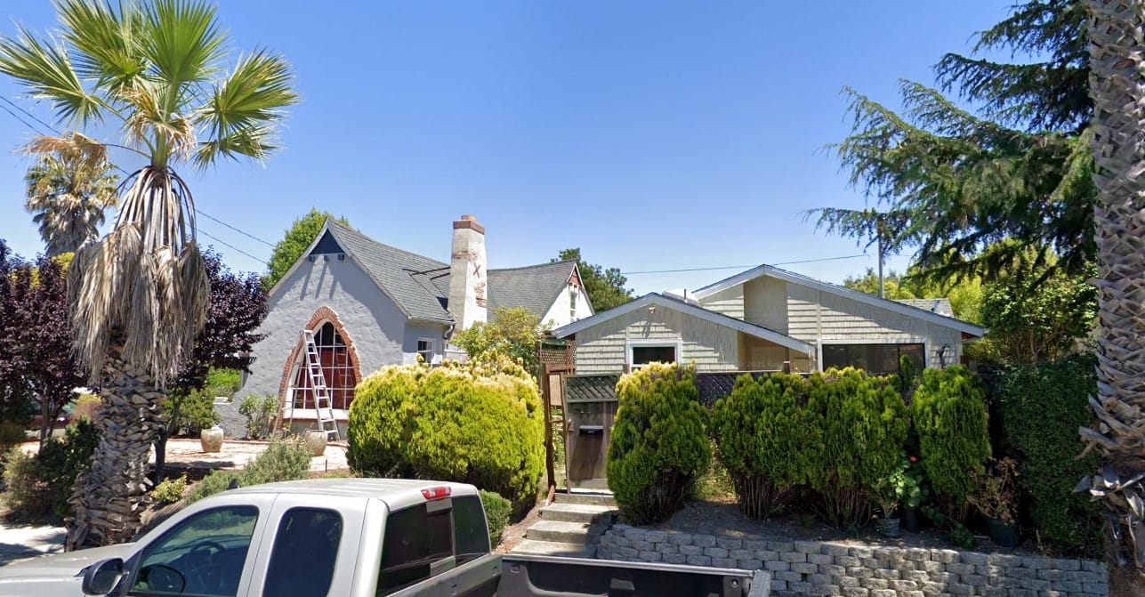 Exterior view of a residential facility with landscaping