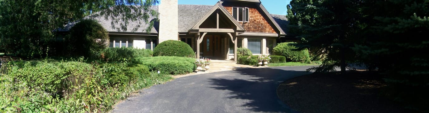 Exterior view of a senior care facility with landscaping
