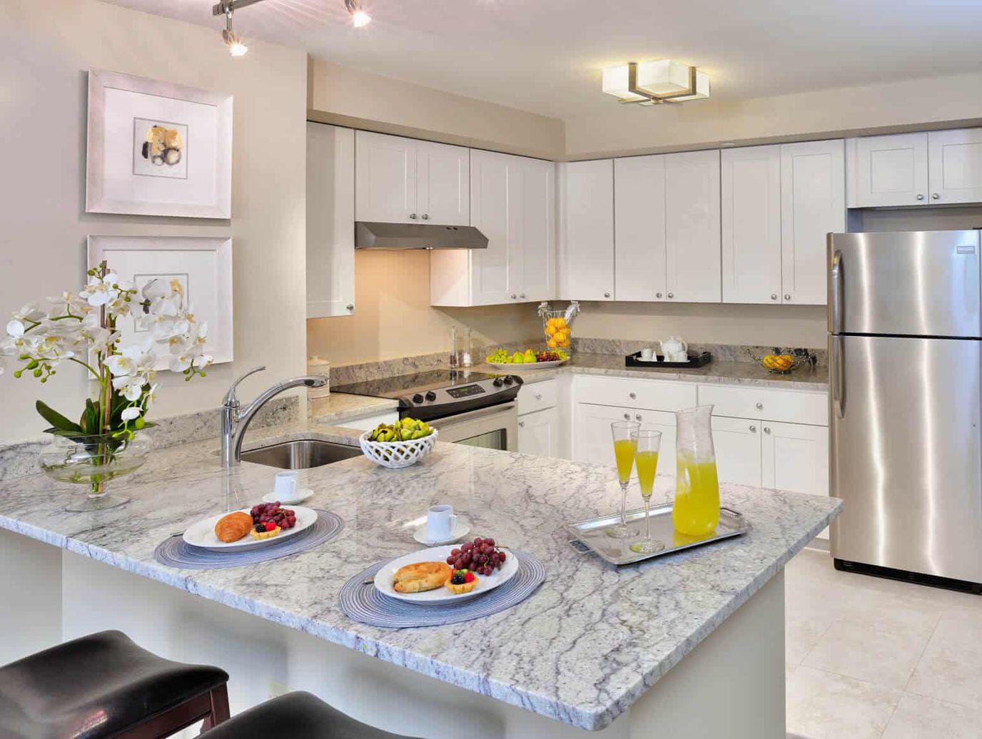 Modern kitchen interior with food and drinks displayed