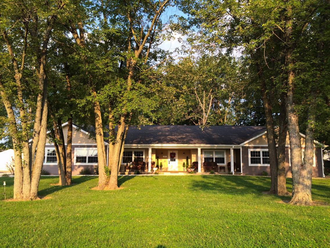 Exterior view of Arbor Rose of Robinson surrounded by trees