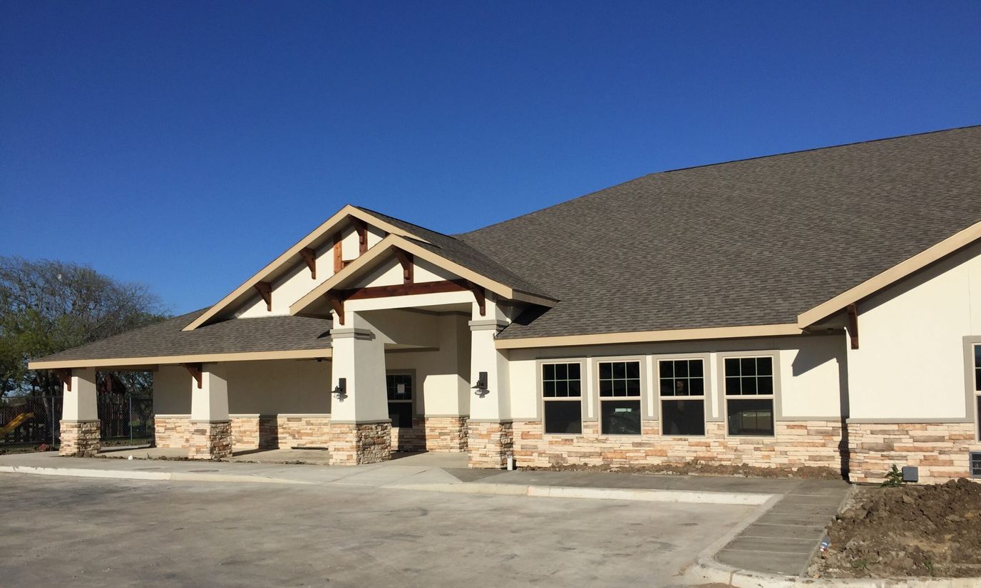 Exterior view of AvilaCare Assisted Living building