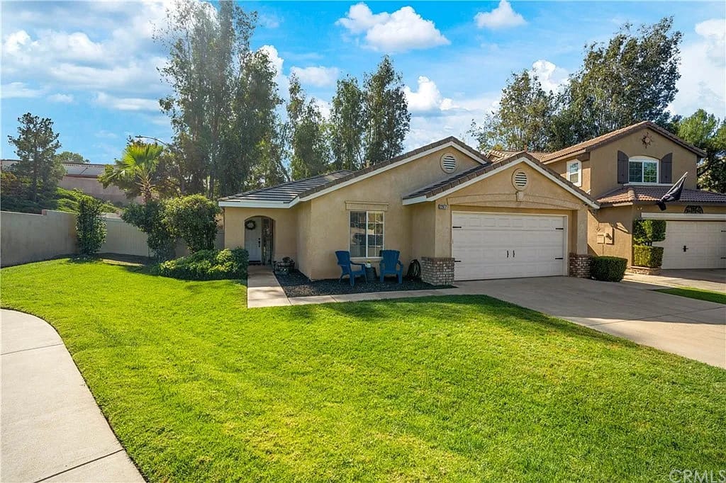 Exterior view of a residential-style building with a lawn