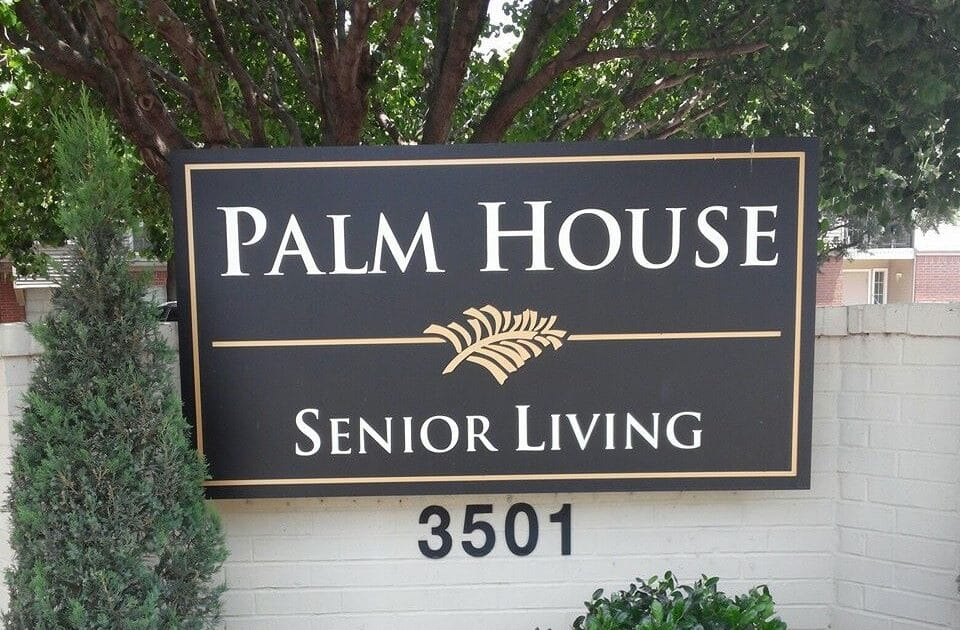 Palm House Senior Living sign at the facility entrance