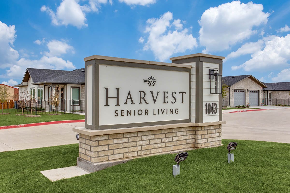 Exterior sign of Harvest Senior Living facility