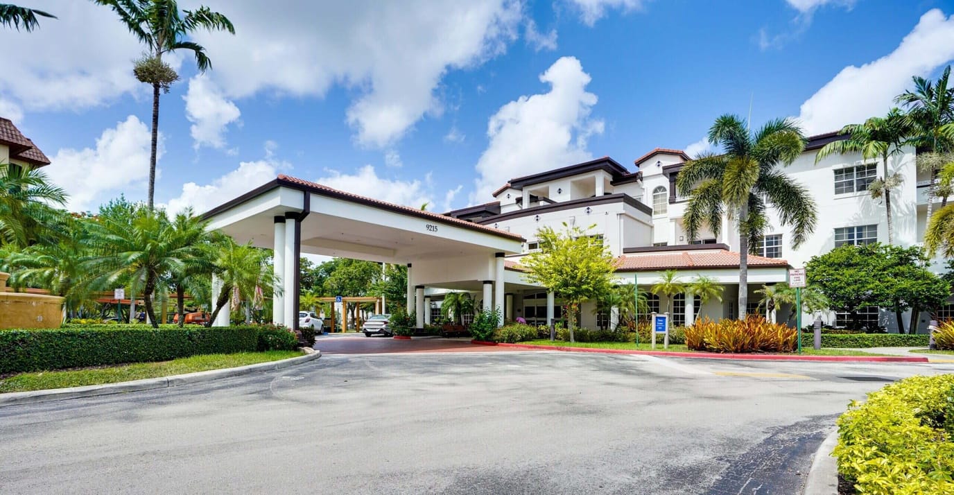 Entrance view of Covenant Village Care Center with landscaping