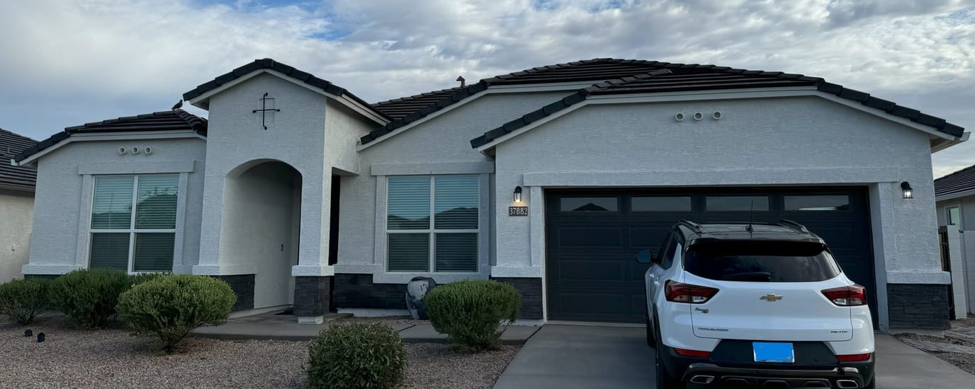 Exterior view of a residential building with landscaping