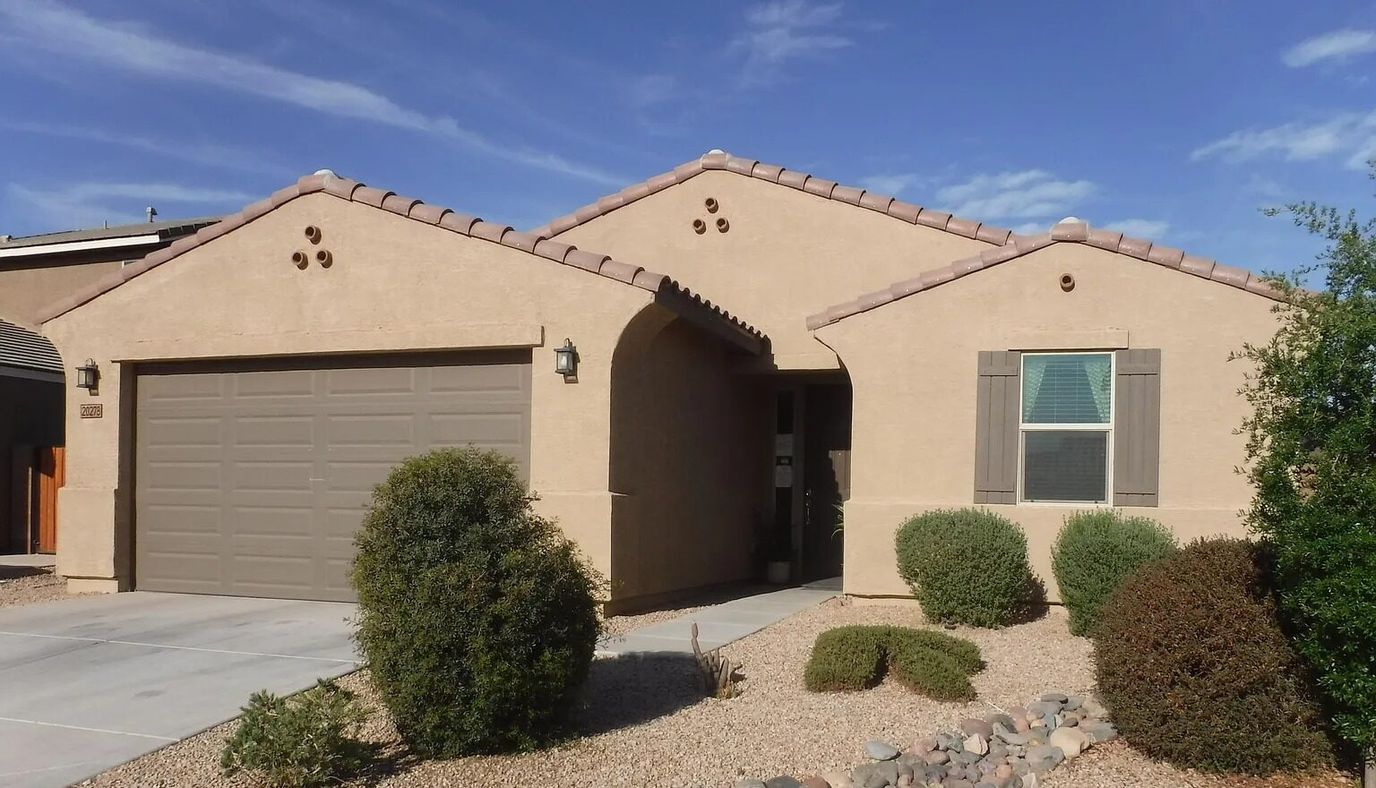 Exterior view of a house with landscaping