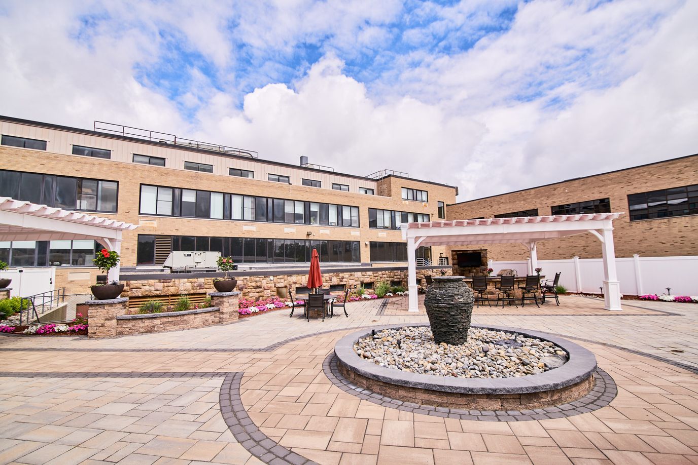 Outdoor courtyard with seating and landscaping