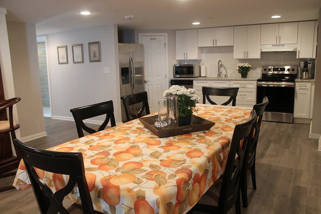 Modern dining area with a table and chairs