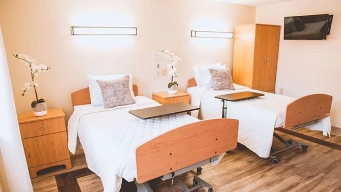 Welcoming shared room with twin beds and modern decor