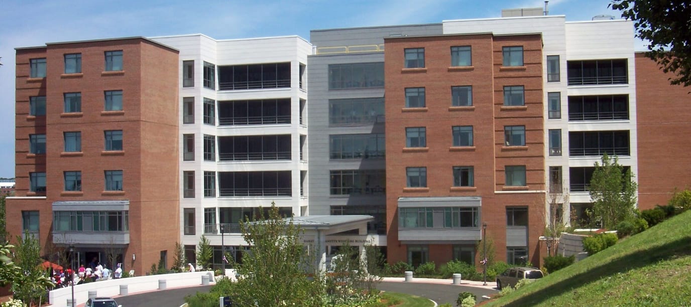 Exterior view of The Leonard Florence Center with landscaping