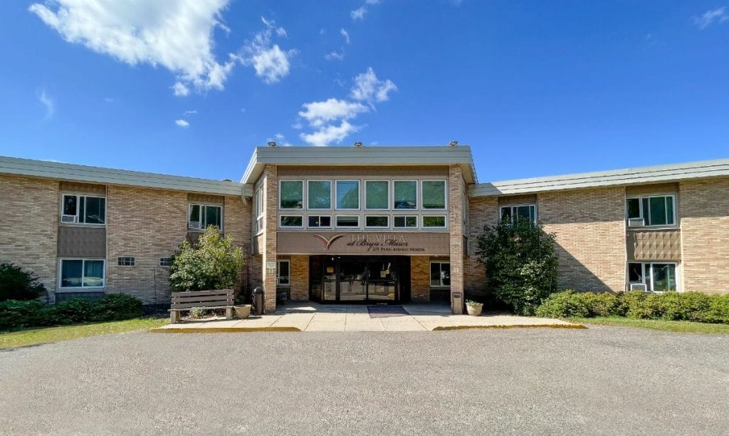 Front view of the assisted living facility with a clear entrance