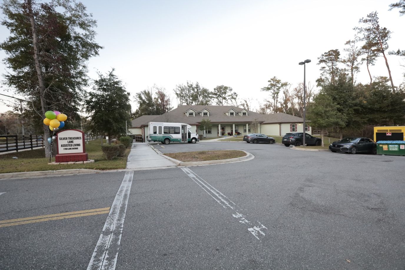 Exterior view of the facility with parking and shuttle