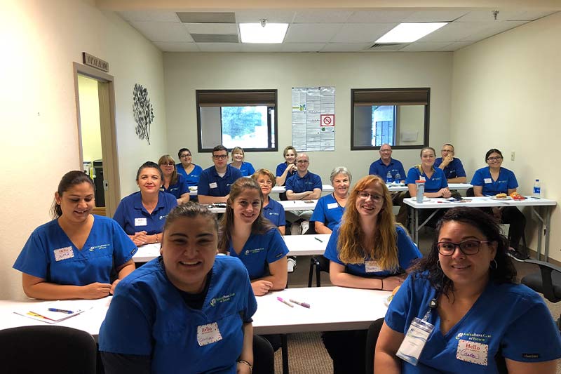 Staff members participating in a training session