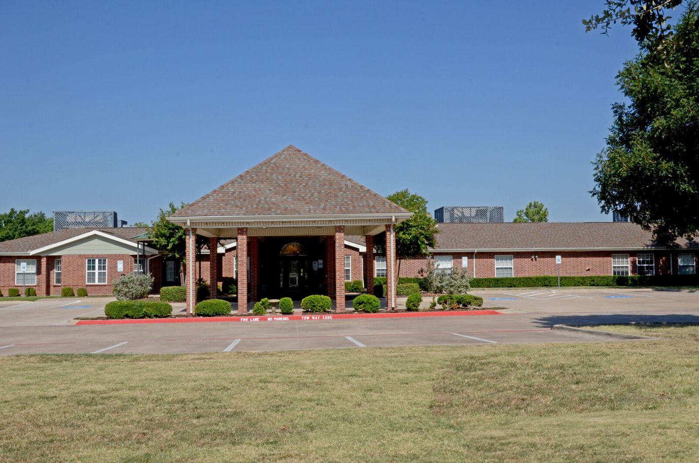 Exterior view of Victoria Gardens building entrance