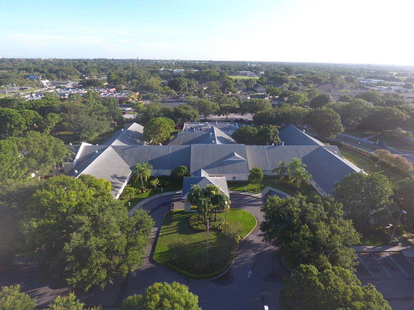 Aerial view of Palm Garden of Pinellas facility surrounded by greenery
