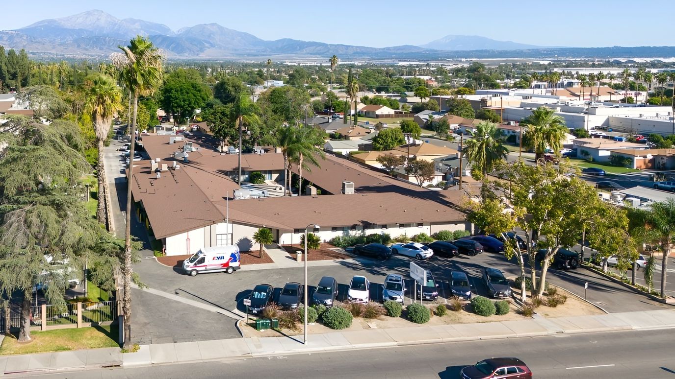 Aerial view of Arrowhead Springs Healthcare Center with vehicles in the parking lot