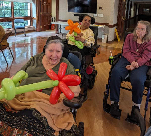 Residents participating in a balloon activity