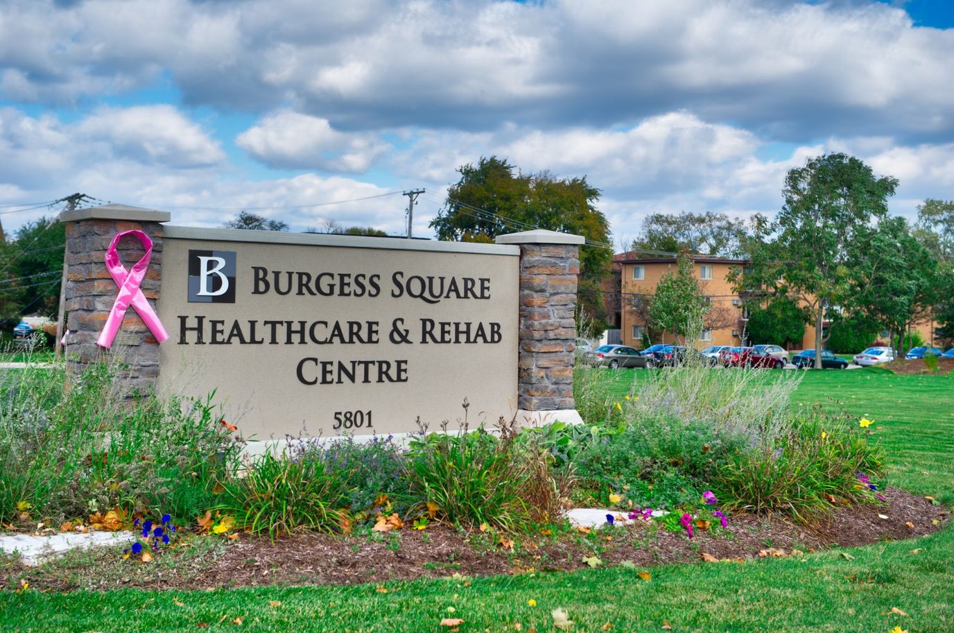 Facility sign in front of Burgess Square Healthcare