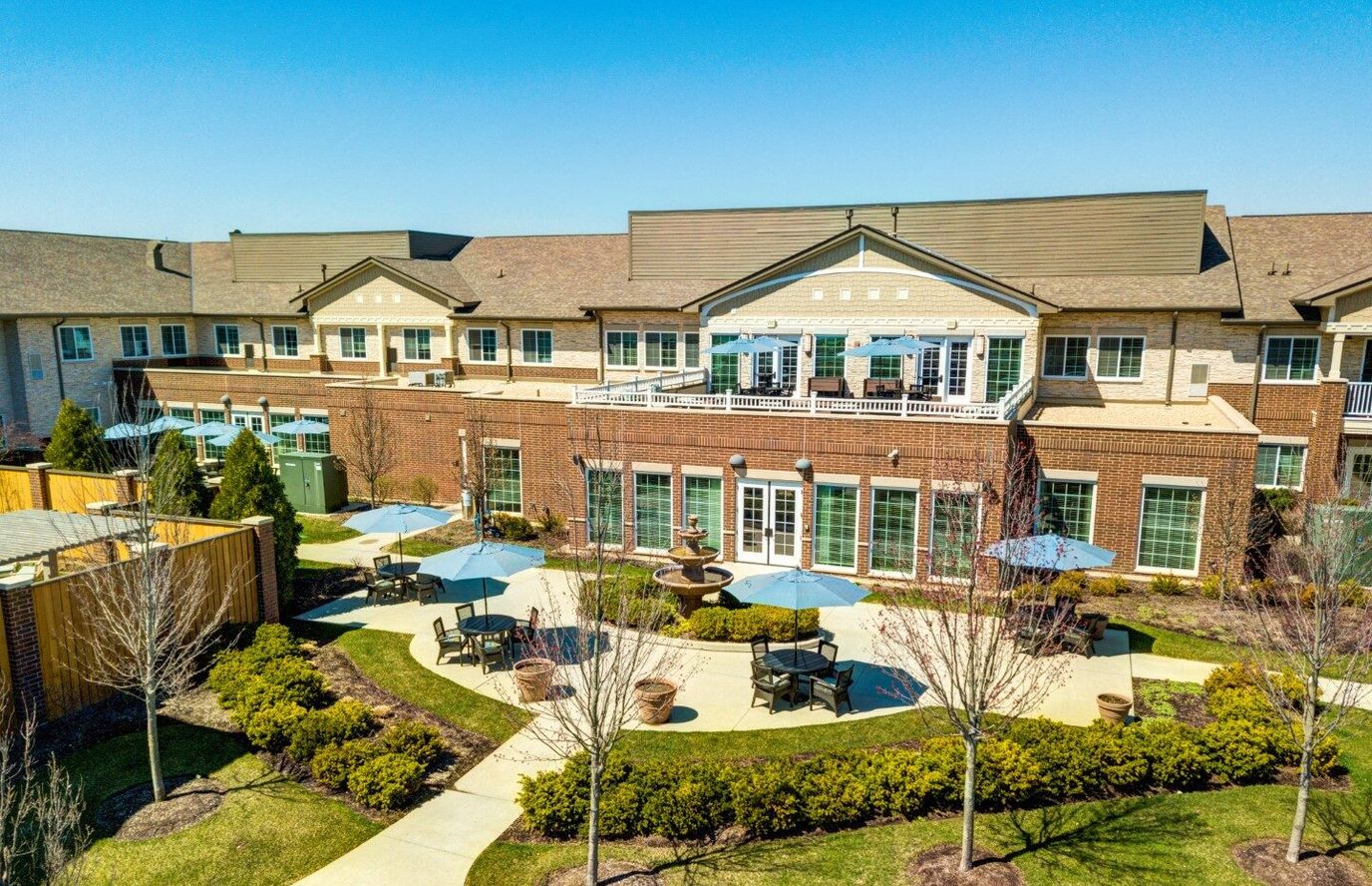 Aerial view of the Burr Ridge Senior Living building and outdoor space.