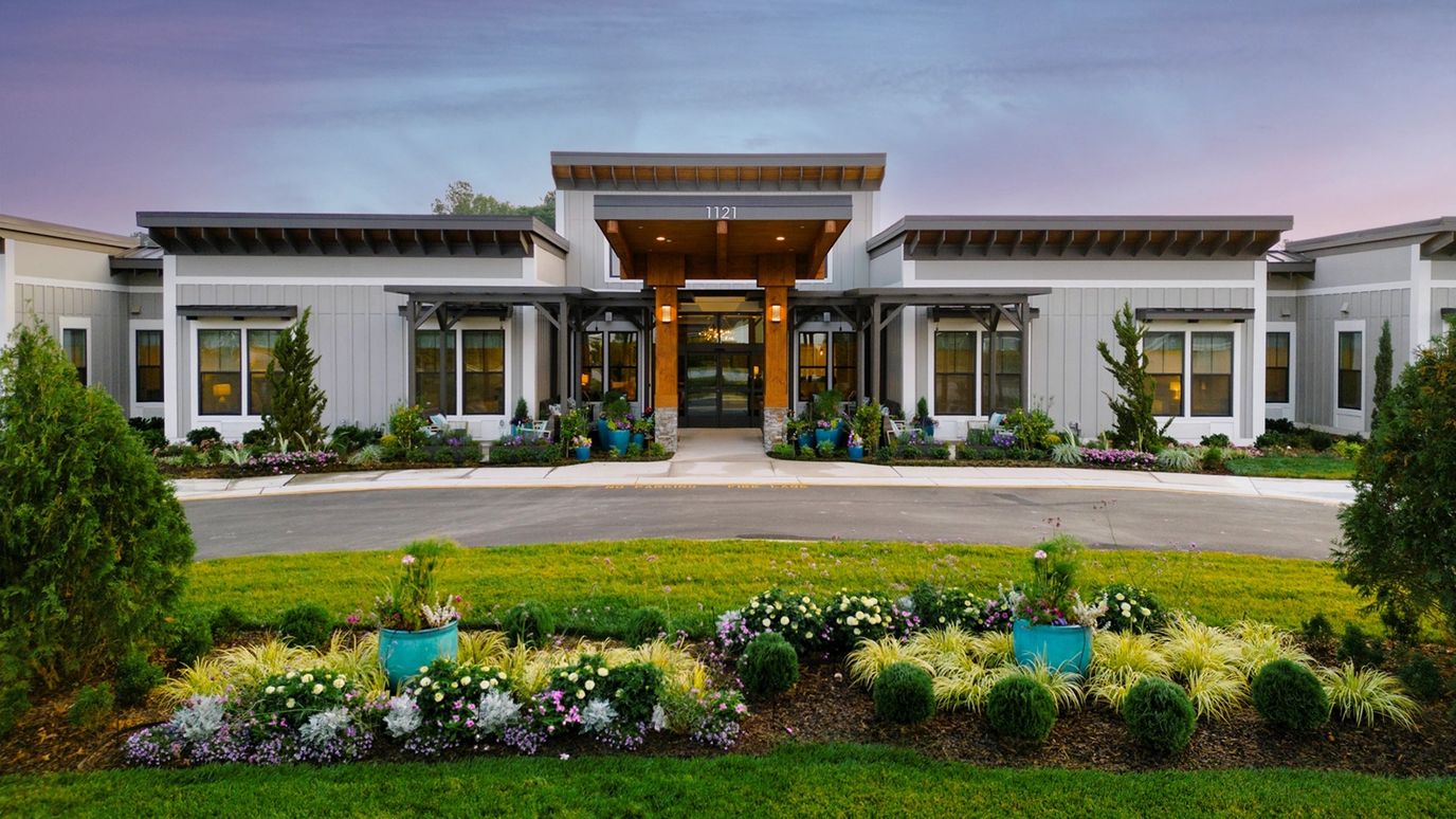 Exterior view of Calyx Living of Fuquay-Varina with landscaping