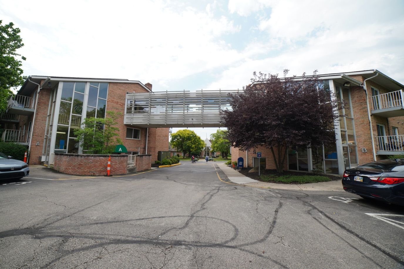 Exterior view of a senior living facility with walkways