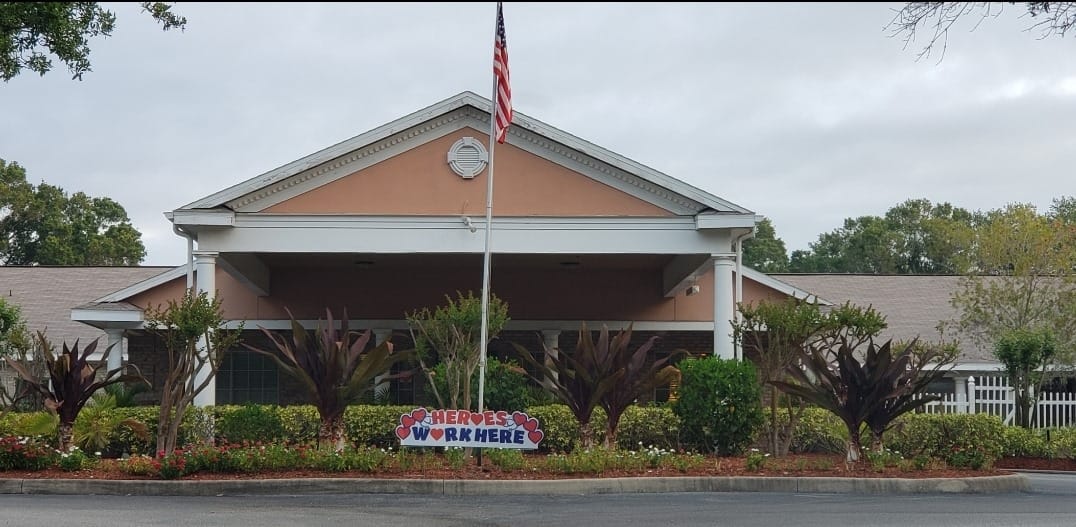Front view of Gulf Shore Care Center with sign